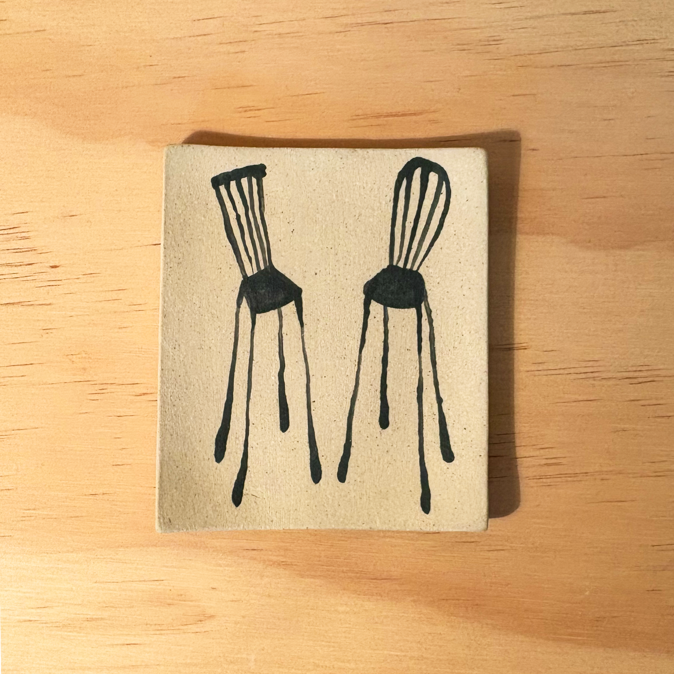 2 big chairs small dish