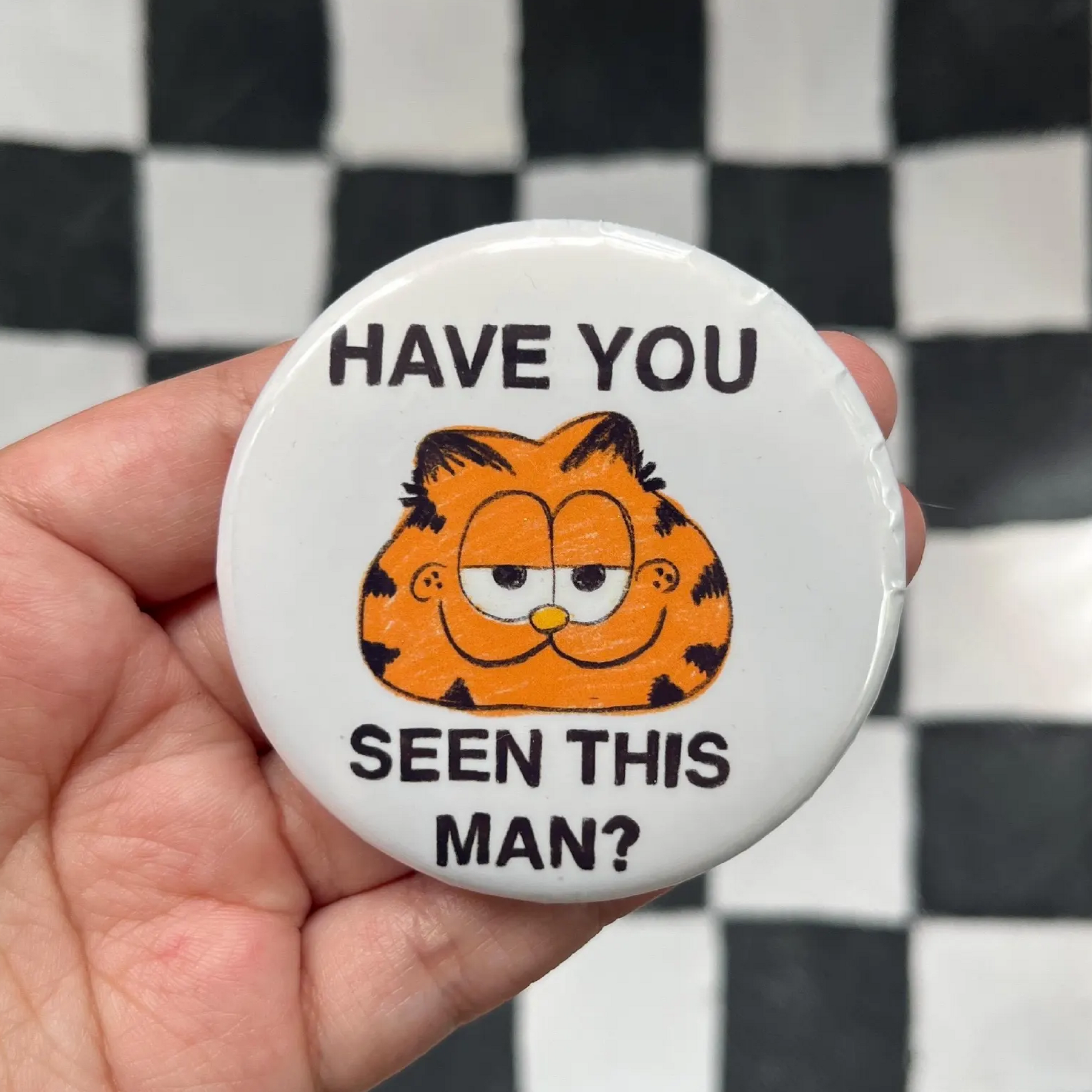 Have you seen this man? button
