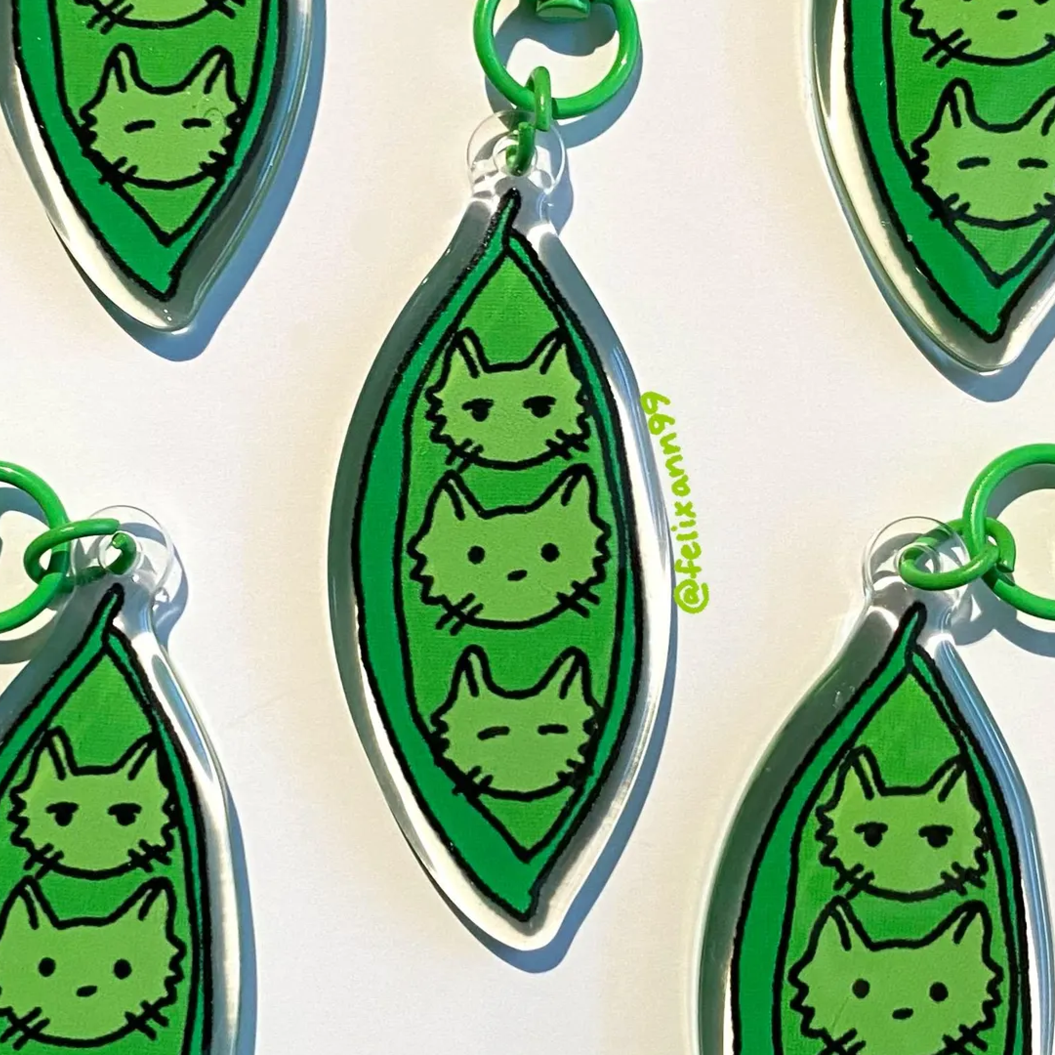 Three Cats In A Pod Keychain