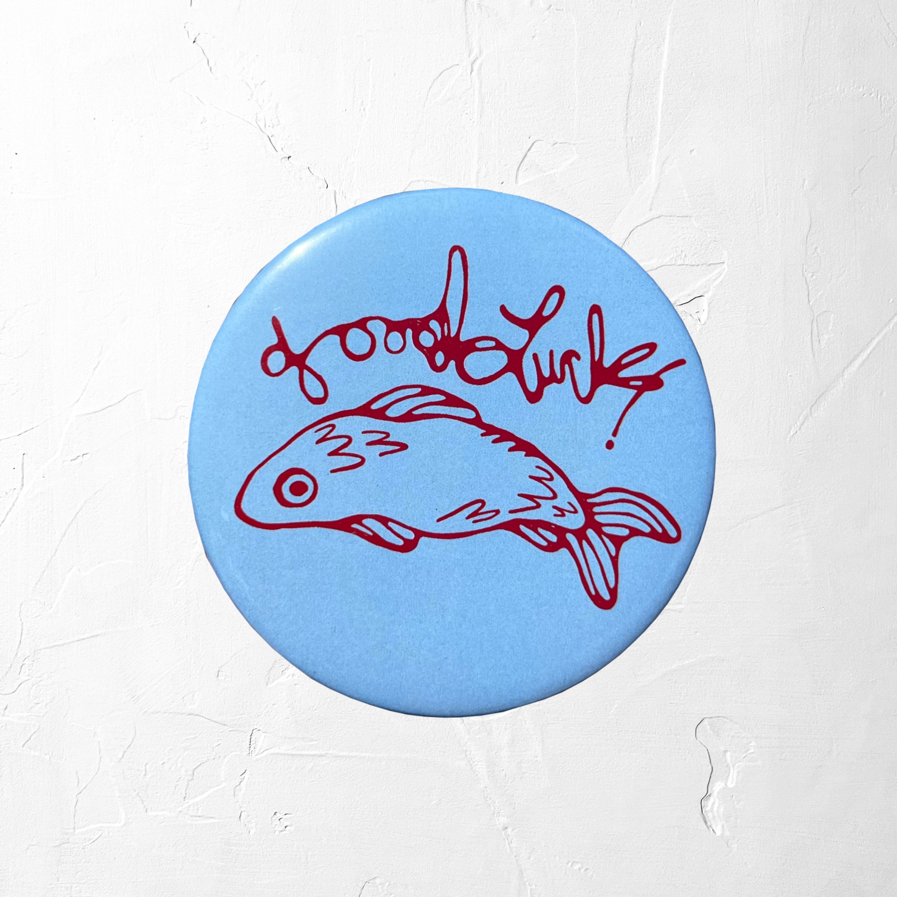 good luck fish button
