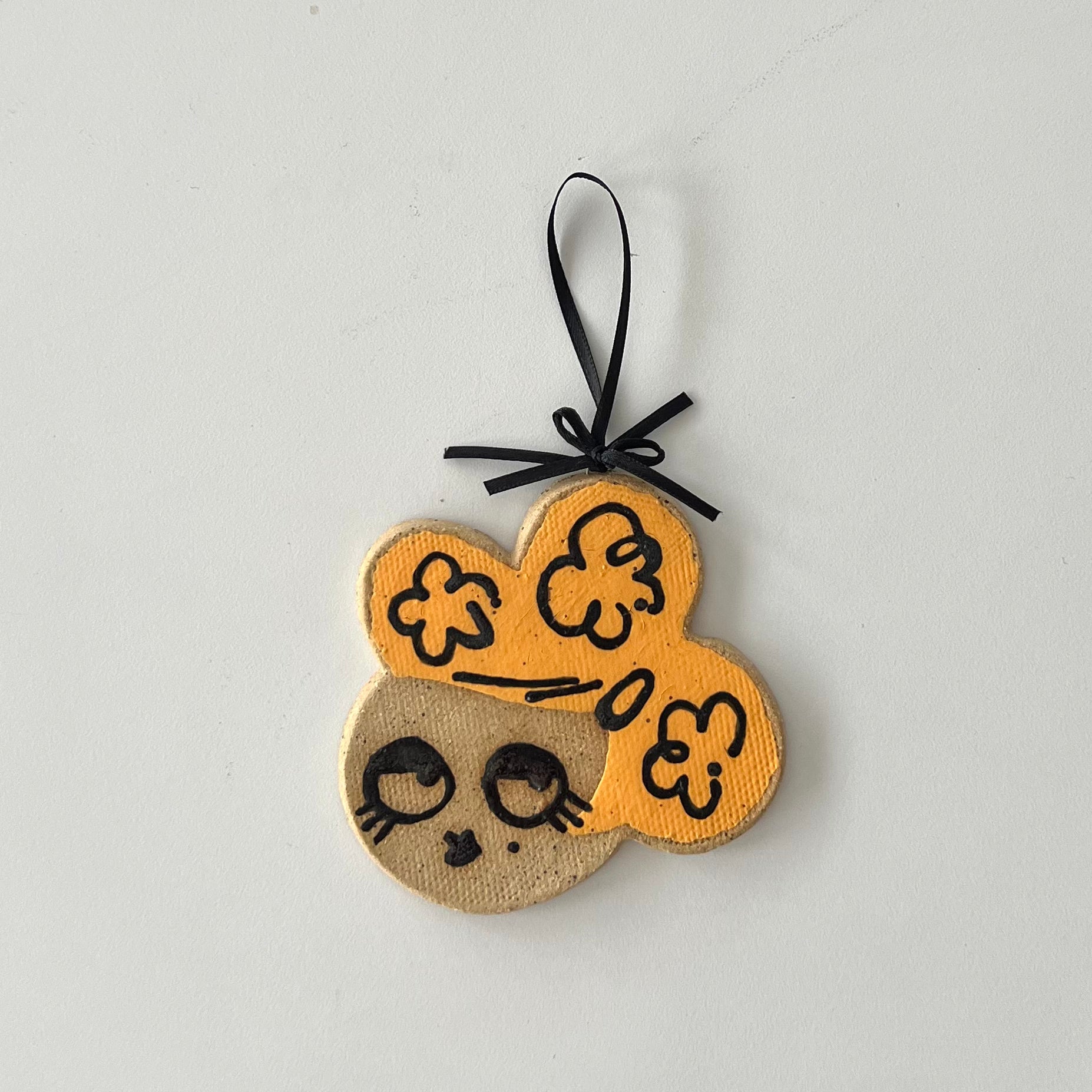 orange girl wall hanging