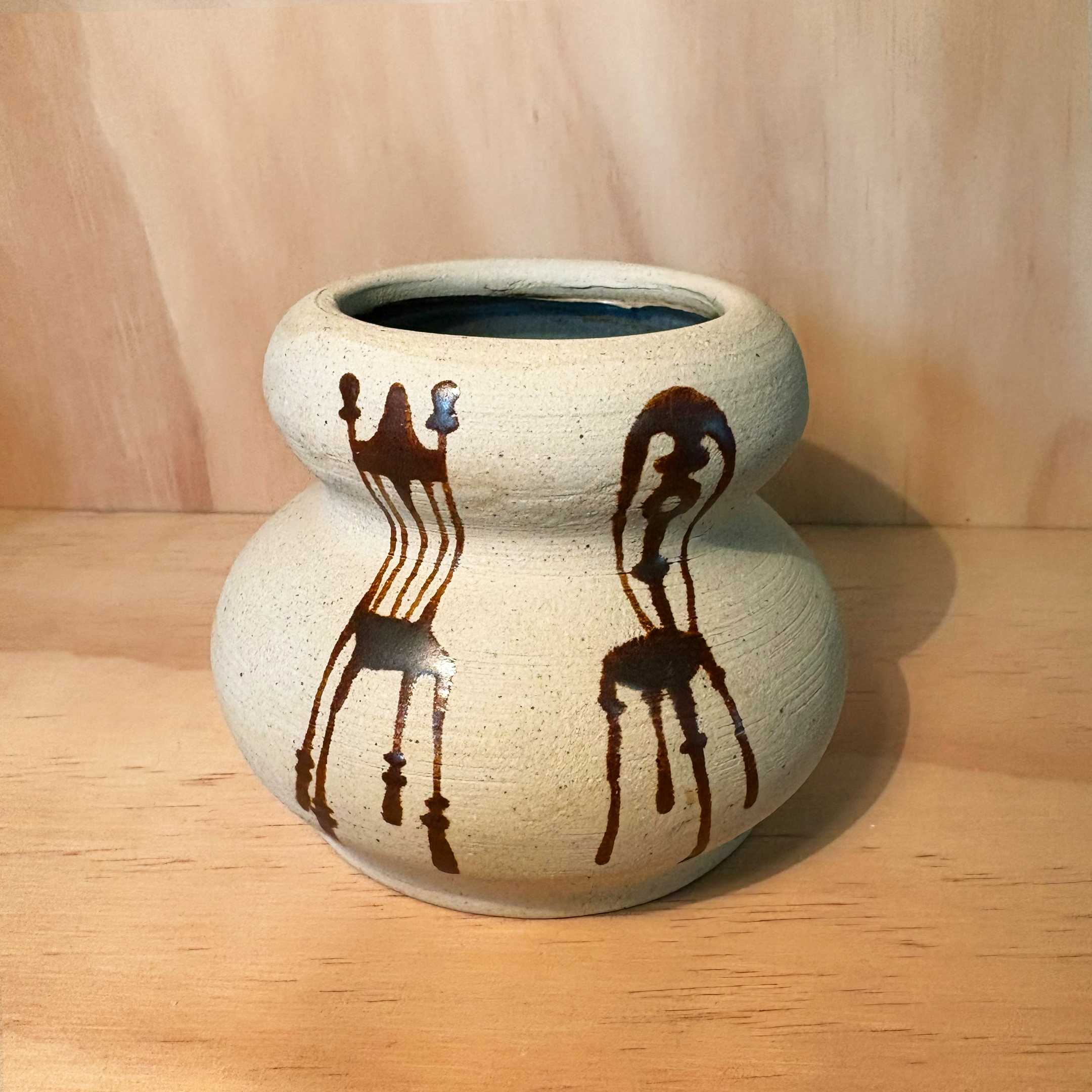 2 Chairs Curvy Vessel